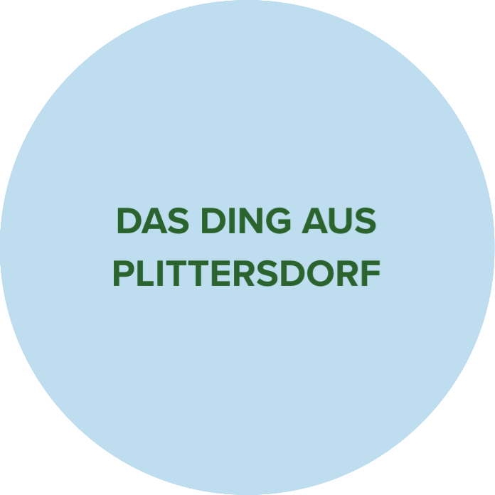 Hellblauer Kreis mit dunkelgrünem Schriftzug "Das Ding aus Plittersdorf".