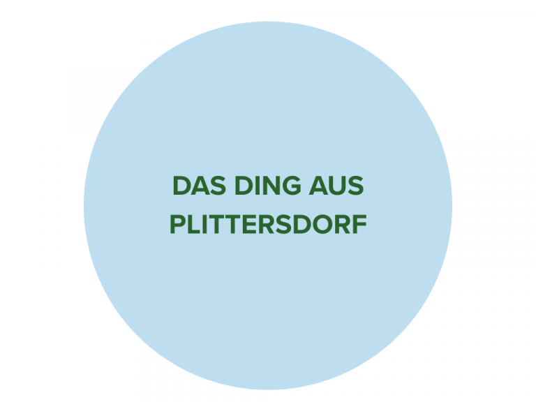 Hellblauer Kreis mit dunkelgrünem Schriftzug "Das Ding aus Plittersdorf".
